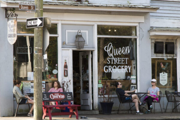 Showing the exterior of the Queen Street Grocery in Charleston, SC.